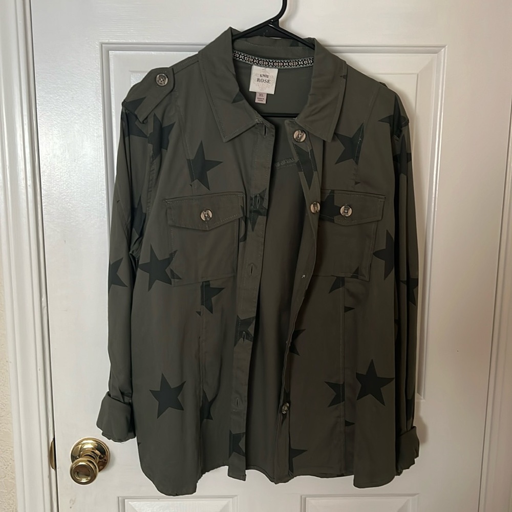 green jacket with stars